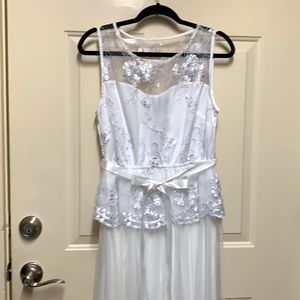 Gorgeous white evening gown. Shear lacey bodice with white satin ribbon.